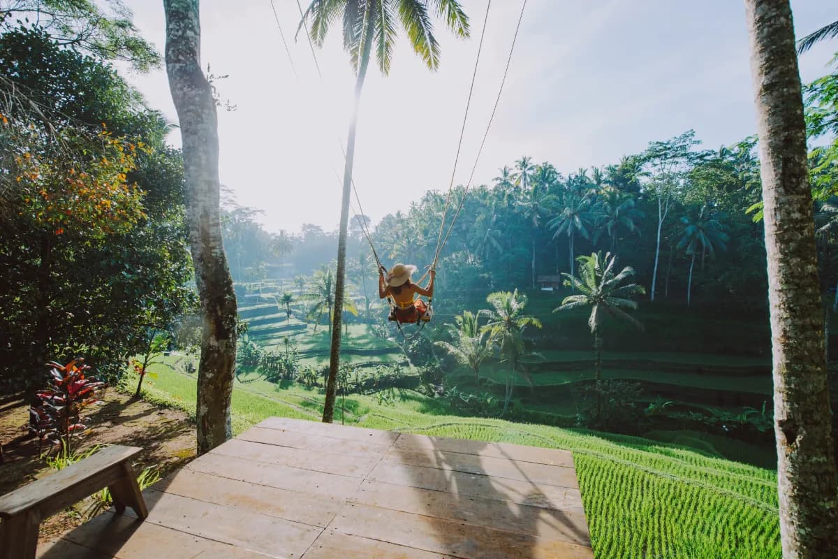 Beautiful girl visiting the Bali rice fields in tegalalang, ubud